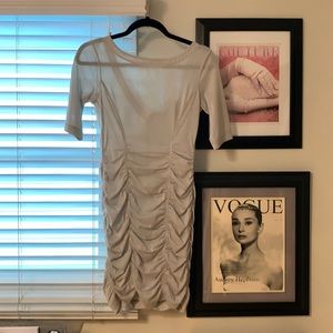 Max and Cleo silver dress with ruching on bottom and sexy v cut in back.